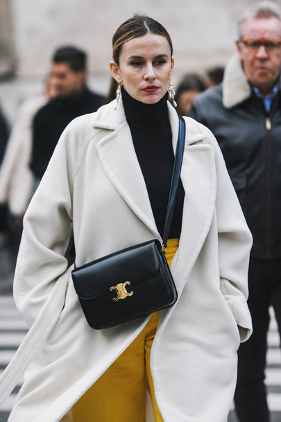 Milan, Italy - February 23, 2019: Street style Outfit after a fashion show during Milan Fashion Week - MFWFW19 - Фото, изображение