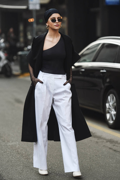 Milan, Italy - February 21, 2019: Street style Outfit before a fashion show during Milan Fashion Week - MFWFW19 - Foto, imagen