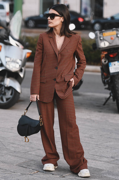Milan, Italy - February 20, 2019: Street style outfit before a fashion show during Milan Fashion Week  - MFWFW19 - Fotografie, Obrázek