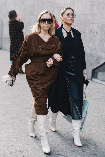 Milan, Italy - February 21, 2019: Street style Outfits after a fashion show during Milan Fashion Week - MFWFW19 - 写真・画像