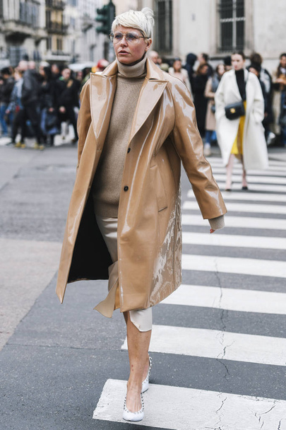 Milan, Italy - February 23, 2019: Street style Outfit after a fashion show during Milan Fashion Week - MFWFW19 - 写真・画像