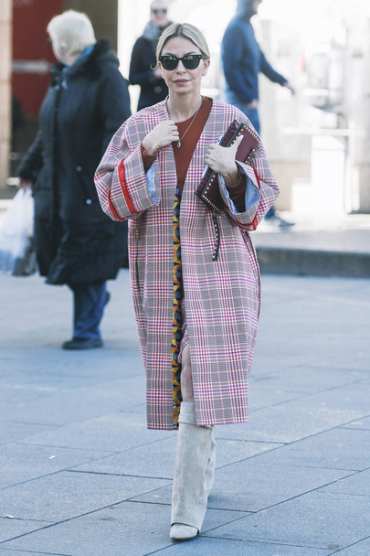 Milan, Italy - February 24, 2019: Street style Tartan co-ord outfit before a fashion show during Milan Fashion Week - MFWFW19 - Photo, Image