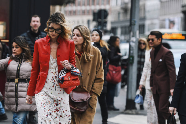 Milan, Italy - February 23, 2019: Street style Outfits before a fashion show during Milan Fashion Week - MFWFW19 - 写真・画像