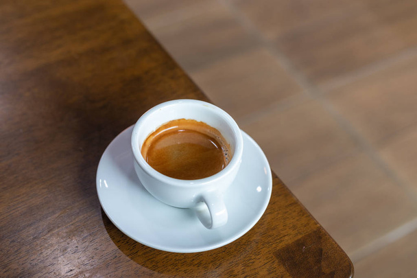 Hot coffee on wood background, black coffee. - Foto, Bild