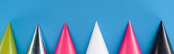  Panoramic shot of party hats on blue party background  - Photo, Image