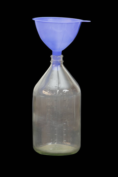 Bottle Measuring plastic with cone on black background with cipp - Фото, зображення