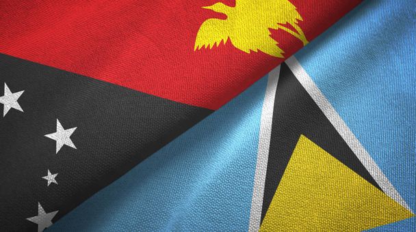 Papouasie-Nouvelle-Guinée et Sainte-Lucie deux drapeaux tissu textile, texture du tissu
 - Photo, image