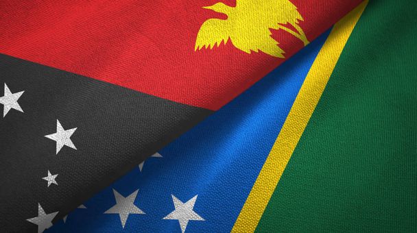 Papua Yeni Gine ve Solomon Adaları iki bayraklar tekstil kumaş, kumaş doku - Fotoğraf, Görsel