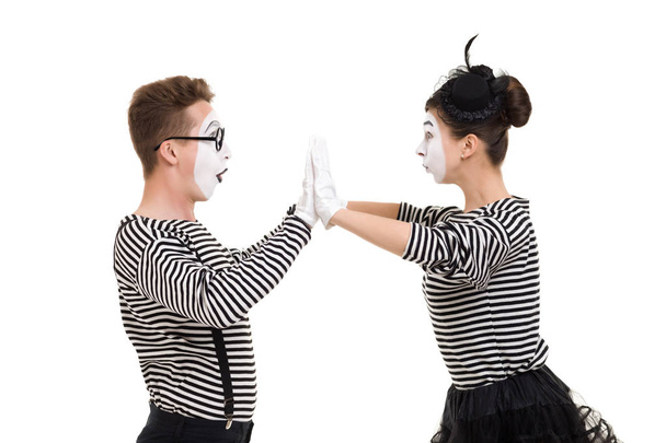 Smiling mimes in striped shirts. - Foto, imagen