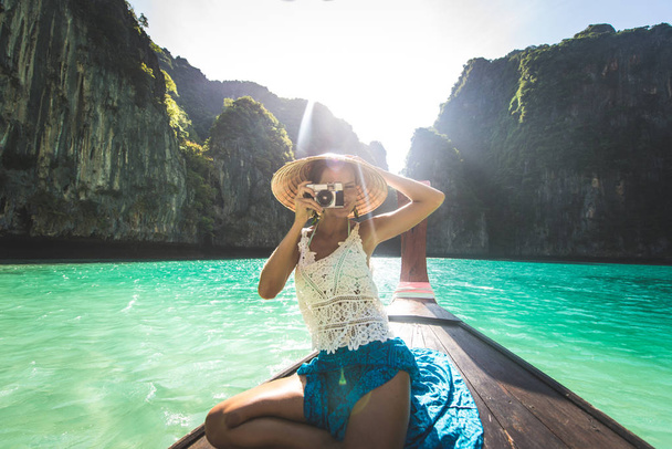 Beautiful woman on a long-tail boat in Thailand - Фото, зображення