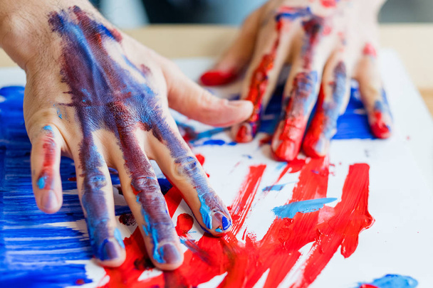 man hands paints art therapy activity creativity - Foto, afbeelding