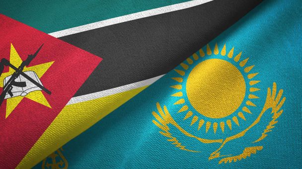 Mozambik i Kazachstan dwie flagi tkanina tekstylna, tekstura tkaniny - Zdjęcie, obraz