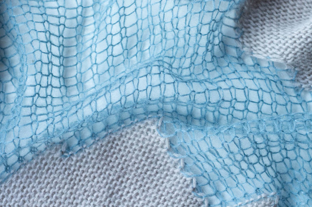 Jersey de lana, fondo azul y beige, textura borrosa
 - Foto, Imagen