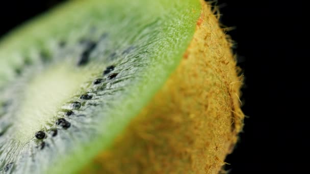 Macro shot of fresh green kiwi fruit rotating. 4k close up footage. - Footage, Video