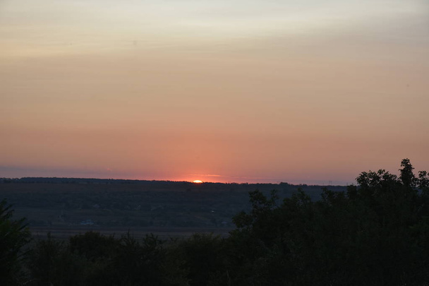 mooie kleurrijke zonsondergang rustige scène  - Foto, afbeelding