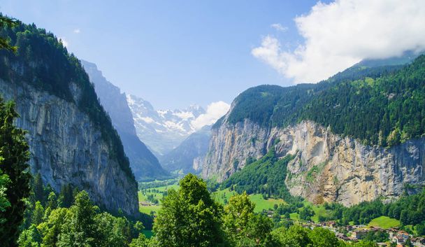 Alpine peaks landscape background. Lauterbrunnen, Jungfrau, Bernese highland. Alps, tourism journey hiking concept - Foto, Imagen