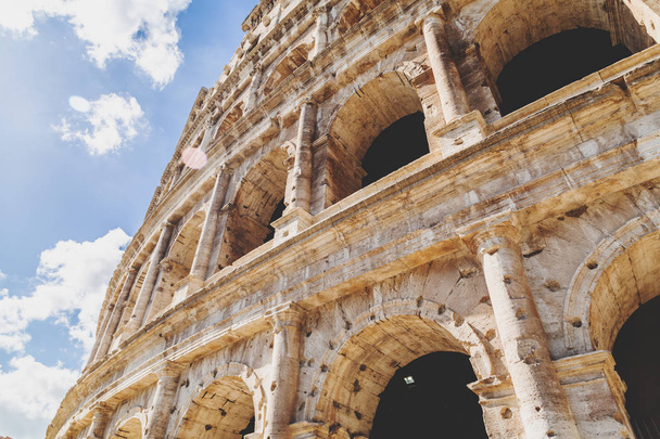 Exterior view of the ancient Roman Colosseum in Rome - 写真・画像