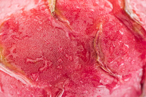 close up view of wet exotic ripe dragon fruit pink textured peel - Photo, Image