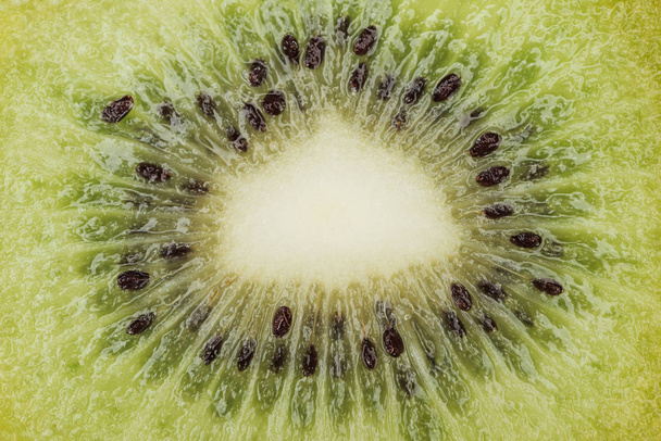 close up view of fresh nutritious green kiwi with black seeds - Fotoğraf, Görsel