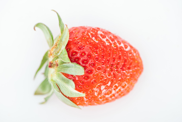 top view of whole ripe red strawberry on white background - Foto, afbeelding