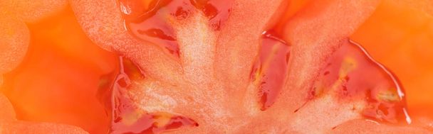 close up view of red ripe fresh tomato half with seeds, panoramic shot - Photo, Image