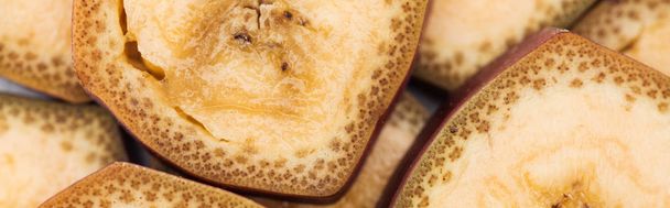 panoramic shot of delicious banana slices in pile - Photo, Image