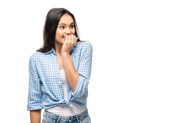 excited girl biting nails Isolated On White with copy space - Photo, Image