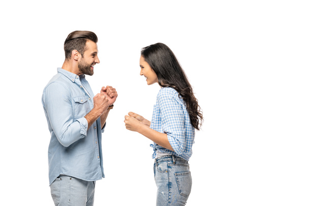 excited man and young woman with clenched fists Isolated On White - Photo, Image