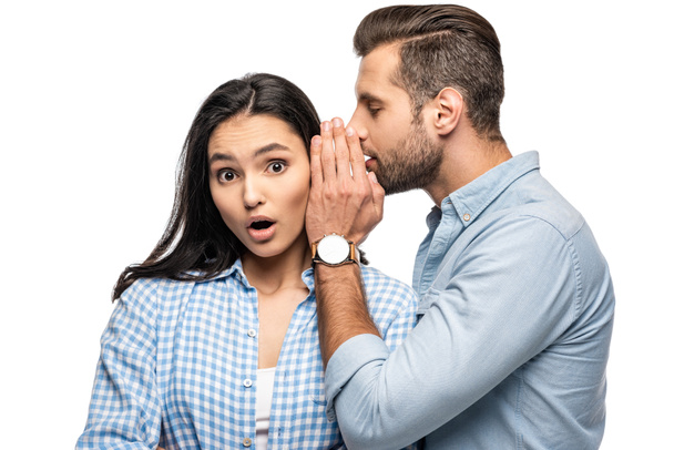 man telling secret to shocked young woman Isolated On White - Φωτογραφία, εικόνα