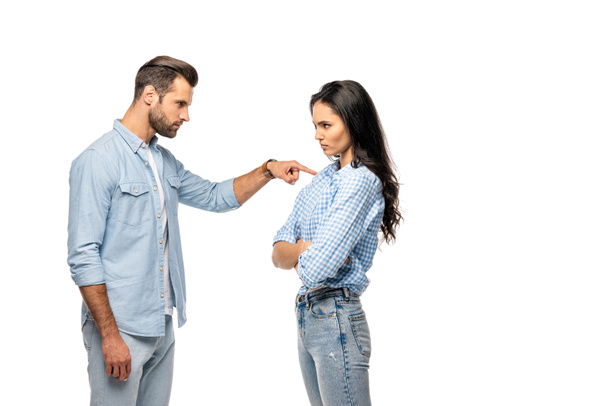 angry man pointing with finger at young woman Isolated On White - Zdjęcie, obraz