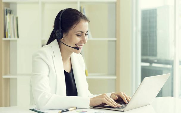 women happy smiling customer support operator with headset.  - Фото, изображение