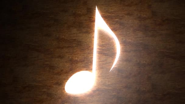 Una nota musicale brillante sul tavolo. La magia della musica. Nota con raggi di luce. 96 96
 - Filmati, video