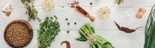 panoramic shot of green herbs and spices on white wooden table - Photo, Image