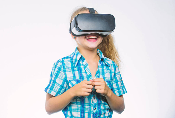 Girl cute child with head mounted display on white background. Small kid use modern technology virtual reality. Virtual education for school pupil. Get virtual experience. Virtual reality concept - Zdjęcie, obraz