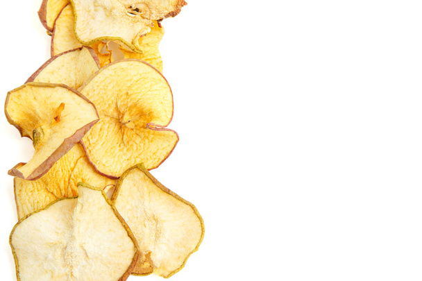 dried apple slices on white isolated background. top view - Foto, Bild