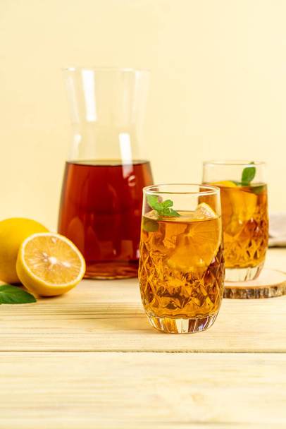 glass of ice lemon tea - Фото, зображення