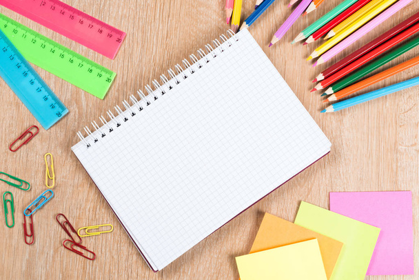 Idea of school still life with pencils and notebook on desk - Foto, imagen