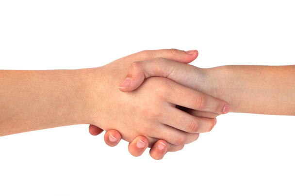 Closeup of people shaking hands isolated on white background - Foto, afbeelding