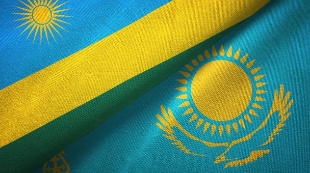 Η Ρουάντα και το Καζακστάν δύο σημαίες ύφασμα υφασμάτων, υφή υφάσματος - Φωτογραφία, εικόνα