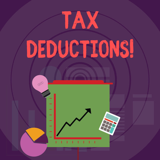 Writing note showing Tax Deductions. Business photo showcasing reduction income that is able to be taxed of expenses Investment Icons of Pie and Line Chart with Arrow Going Up. - 写真・画像