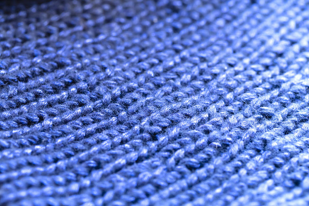 blue knitted woolen background - Foto, afbeelding