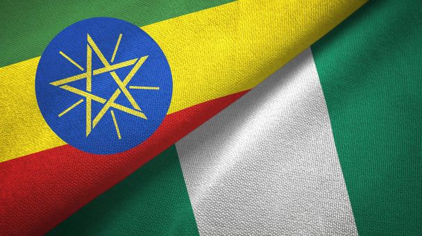 Etiopie a Nigérie dvě vlajky textilní tkaniny, textura textilií - Fotografie, Obrázek