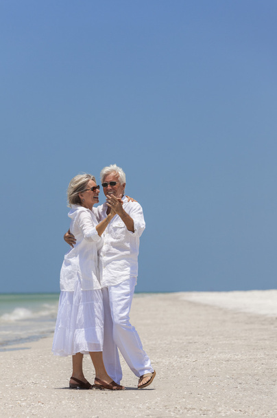 Happy Senior Couple Dancing on Tropical Beach - Photo, Image