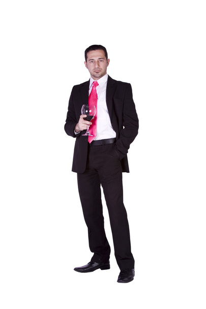 Businessman celebrating with a glass - Photo, image