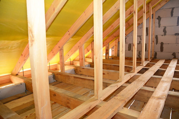 Roofing Construction Attic Interior. Wooden Roof Beams,  Frame House Attic Construction. - Photo, Image