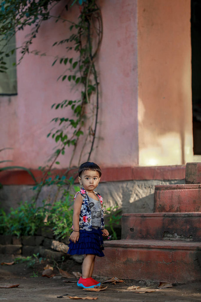 Indian Little Girl child  playing  - Φωτογραφία, εικόνα