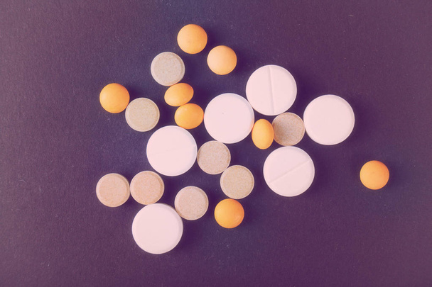 Pills close up on black background - Φωτογραφία, εικόνα