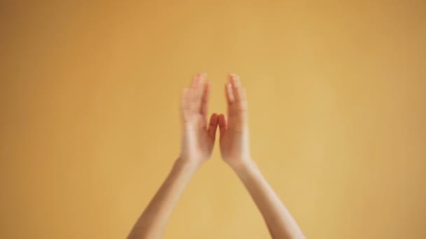 Female hands making praying gestures crossing fingers putting palms in namaste - Πλάνα, βίντεο