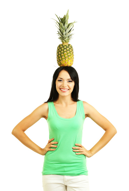 Girl with fresh pineapple isolated on white - Fotó, kép