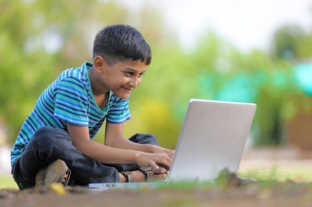 Indian Child on laptop - Foto, Imagem